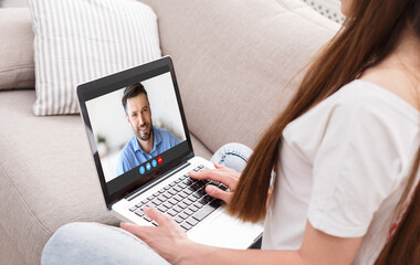 Fototapeta na wymiar Web Communication. Unrecognizable Woman Using Laptop For Video Call With Husband