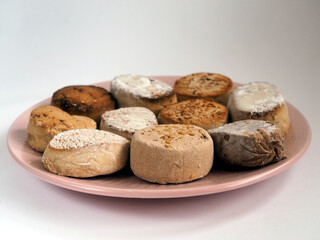 A plate of traditional Spanish Christmas cookies. Many different Estepa, Polvoron, Mantecado, Nevaditos