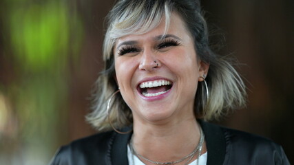 Fototapeta premium Woman natural smile and laugh. Authentic candid person smiling and laughing