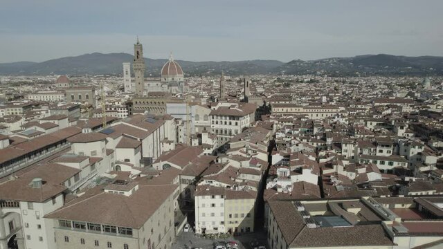 Aerial footage video near river - panoramic view of Florence	