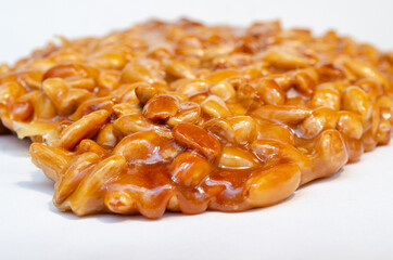 almonds caramelized prepare on restaurant kitchen isolate on white