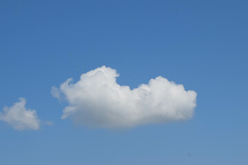 Cumulus white cloud floating on blue sky in beautiful morning