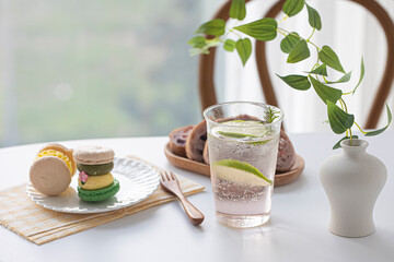 Sweet thick macarons on the plate. white background.