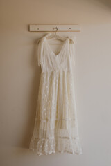 wedding dress hanging on the hanger