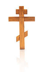 Wooden isolated cross on a white background.