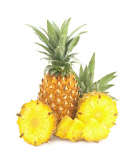 Fresh ripe pineapple fruit and pineapple fruit slices isolated on white background. 