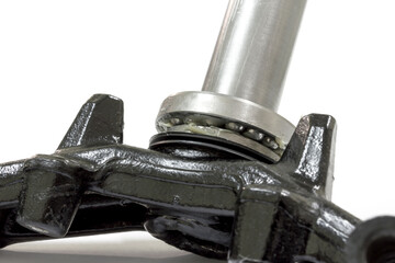 Close up of motorcycle steering stem bearing on white background, Isolated, Motorcycle maintenance...