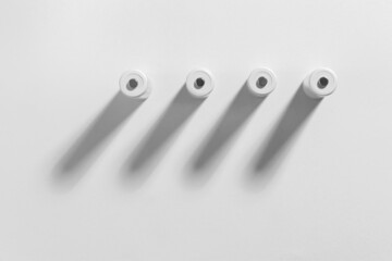 AA size alkaline batteries on a white background. Several batteries in a row. Space for text.