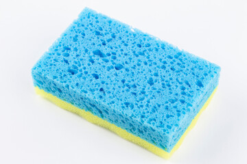 Artificial fibre sponge on a white background.