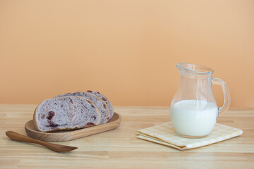 Glass of fresh milk with Whole wheat sliced bread isolated.