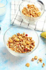 Granola with fruit on a blue background