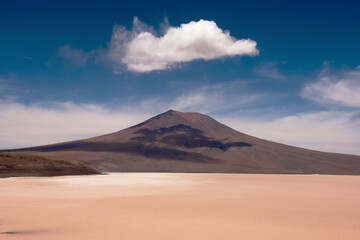 Fototapeta na wymiar Cloud atop a volcano in the Atacama desert, Chile.