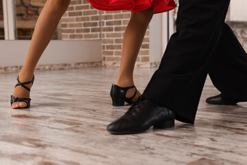 Couple of kids dancing together in studio, closeup