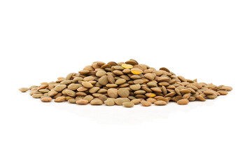 Brown lentils on a white background