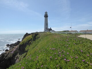 Fototapeta na wymiar lighthouse and the beach