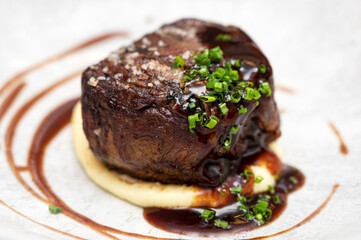 Medium Rare Fillet Mignon Steak with Herb Garlic Butter. High quality photo