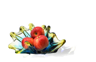 Red apples in vase isolated on white background