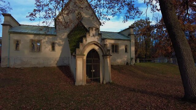 gothic style building in a park outside Vienna, Austria in the sunset times of a golden autumn day