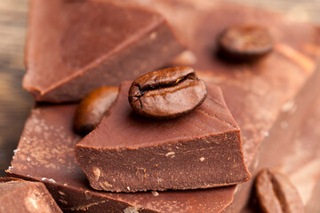 coffee and pieces of milk chocolate from cocoa