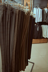 row of mens trousers