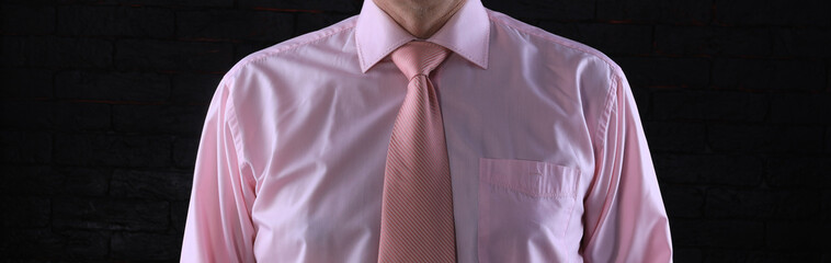 man in pink shirt and pink tie