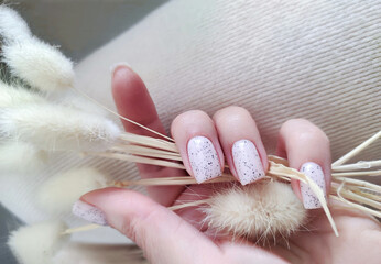 Stylish art manicure with pastel nail polish
