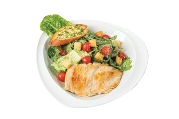 Caesar salad with chicken fillet and parmesan cheese isolated on white background.