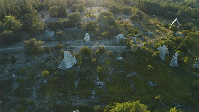 Aerial shot over a collection of limestone rauks on Gotland, Sweden
