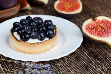 tartlet with cream and blueberries