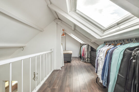 Interior of wardrobe room on mansard floor