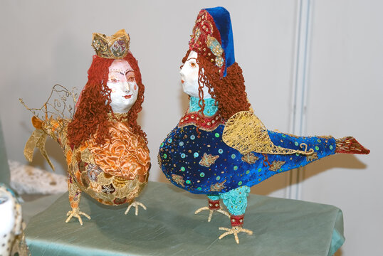 Collectible dolls, which resemble two Gamayun birds