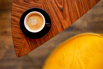 Coffee on an old table.	