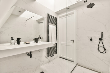 Interior of modern marble bathroom with shower cabin and shelf