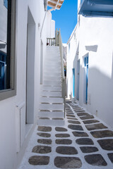 Mykonos island, Chora village. Cyclades Greece. Whitewashed buildings, narrow cobblestone alley
