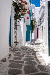 Mykonos island, Chora village. Cyclades Greece. Whitewashed buildings, narrow cobblestone alley