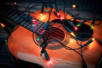 colorful fairy lights on a classical guitar