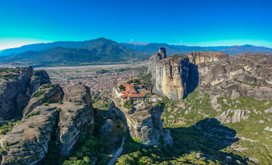 Aerial view over Meteora, a rock formation in central Greece hosting one of the largest most precipitously built complexes of Eastern Orthodox monasteries. Kalampaka, Greece, Europe