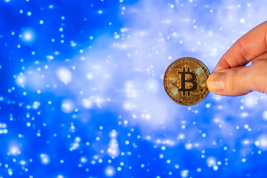 Crop person showing bitcoin in space