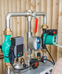 Samples of plumbing equipment in close-up in a metal box in the room