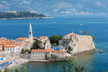 Panoramic cityscape of The Old Town of Budva, Montenegro, beautiful top view of Adriatic Sea and the Balkan Mountains