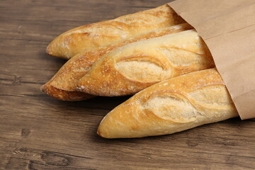 Several baguettes of bread on a table
