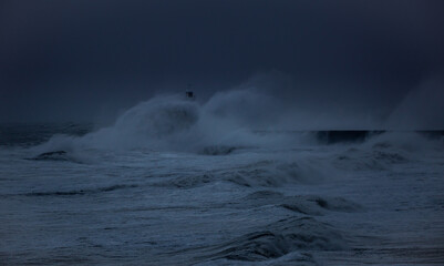 The gale force winds from Storm Arwen cause giant waves to batter the lighthouse and north pier...