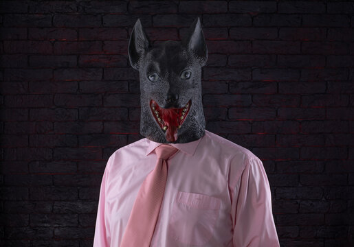 businessman in a mask of a dog