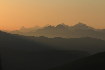 Sunrise view from a place near Gstaad, Switzerland. Mountain ranges in the Bernese Oberland.
