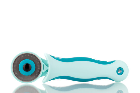 One rotating knife for a seamstress, close-up, isolated on white. - Powered by Adobe