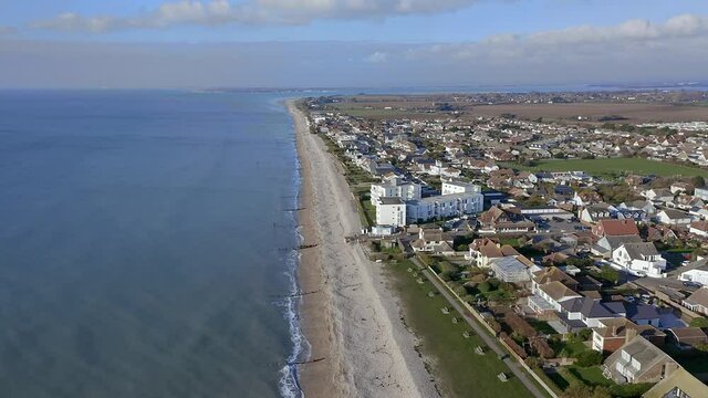 East Wittering seafront a popular resort for tourists in the summer and situated in West Sussex Southern England, Aerial footage.