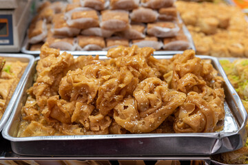 Arabic sweet baked goods, baklawa, baklava, in Mahane Yehuda Market in Jerusalem, Israel
