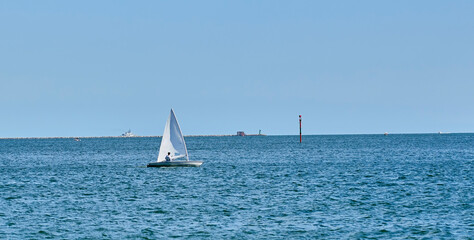 laser sailing boat in the gulf of la spezia