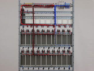 Connection of LED lighting drivers with copper insulated colored wires in the electrical panel.