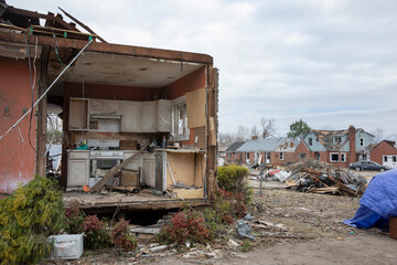 A tornado had ripped off a side of a house in Mayfield Kentucky.